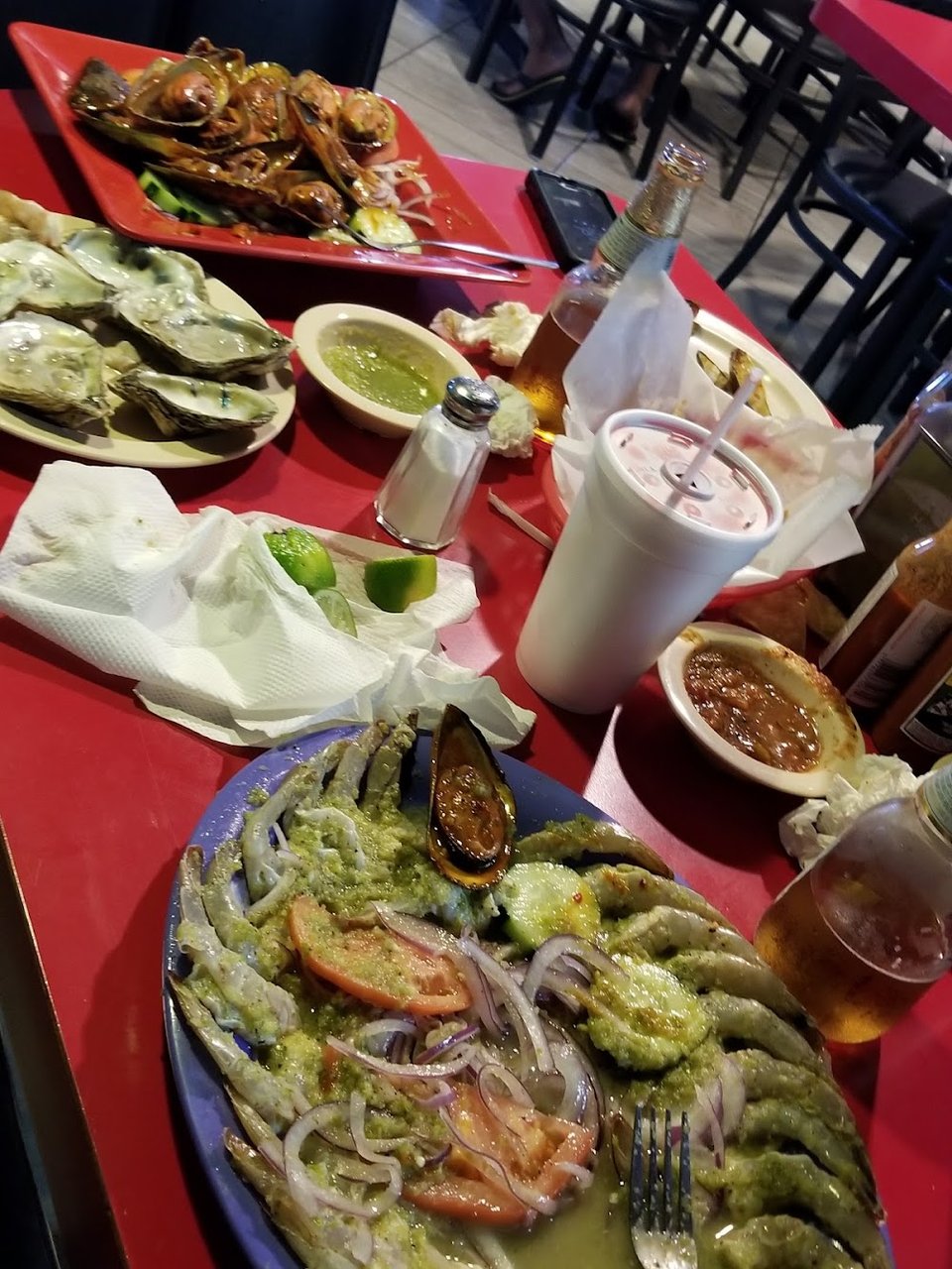 Menu page listing mariscos and drinks.