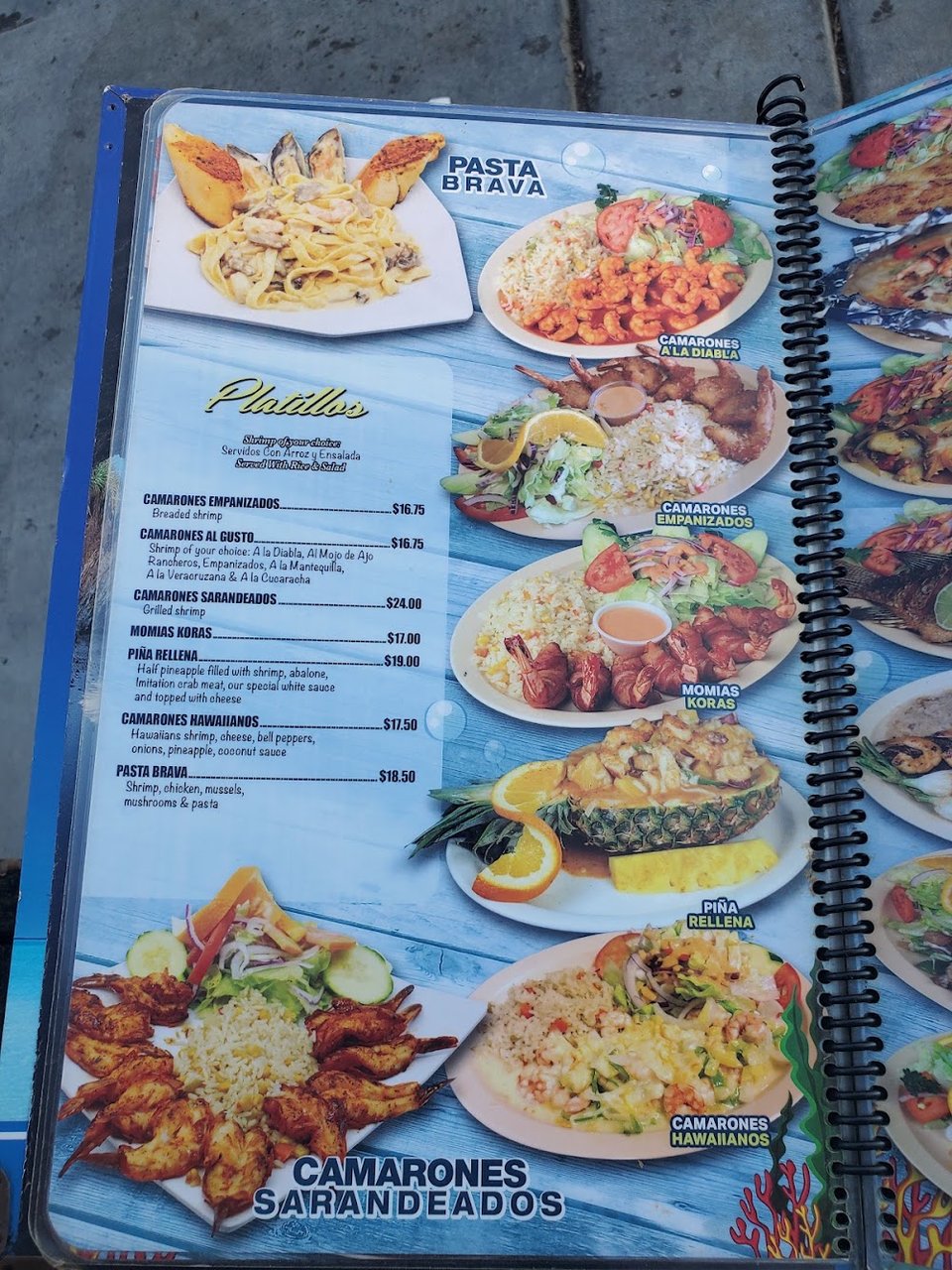 Menu page listing mariscos and drinks.